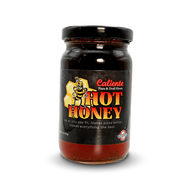 A jar of Caliente Hot Honey, adorned with a sleek black label showcasing a bee, reads: "Use as you see fit. Makes pizza better. Makes everything the best." It's an ideal companion for drizzling on your Pittsburgh Pizza from Caliente Pizza or enjoying with a craft beer at your favorite bar in Pittsburgh.