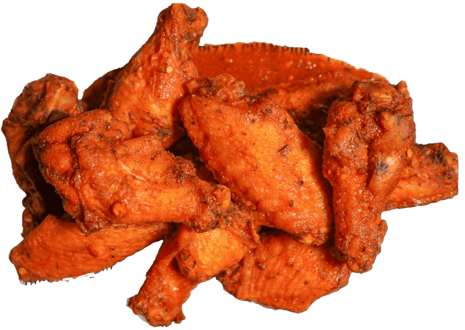 A pile of cooked chicken wings with a crispy, seasoned coating sits ready to be enjoyed at Pittsburgh Pizzeria. The wings appear to be well-cooked with a textured surface, making them the perfect appetizer alongside your favorite Caliente Pizza.