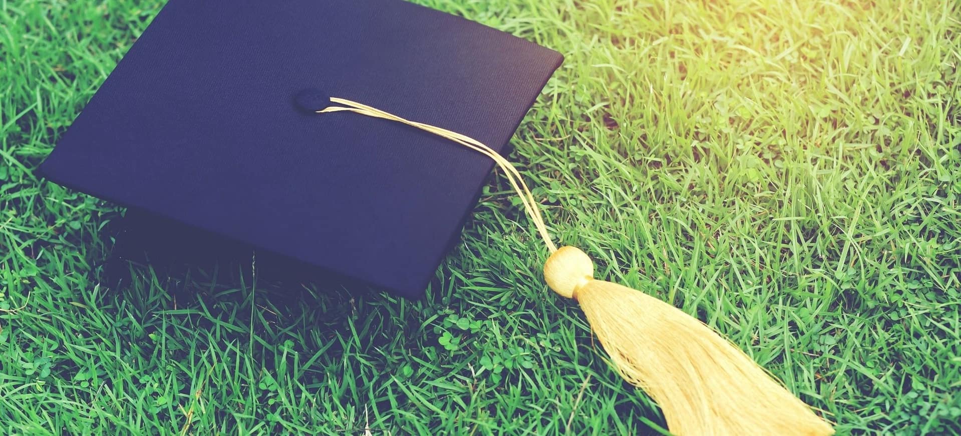 Graduation cap on ground after graduation