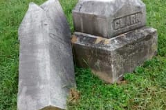 broken cemetery monument before