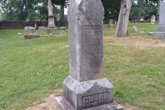 repaired cemetery monument before