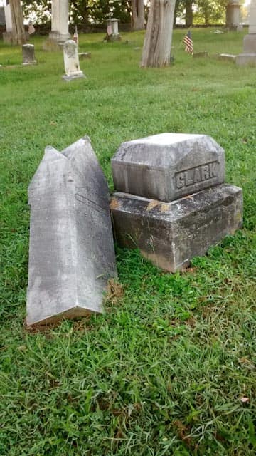 broken cemetery monument before