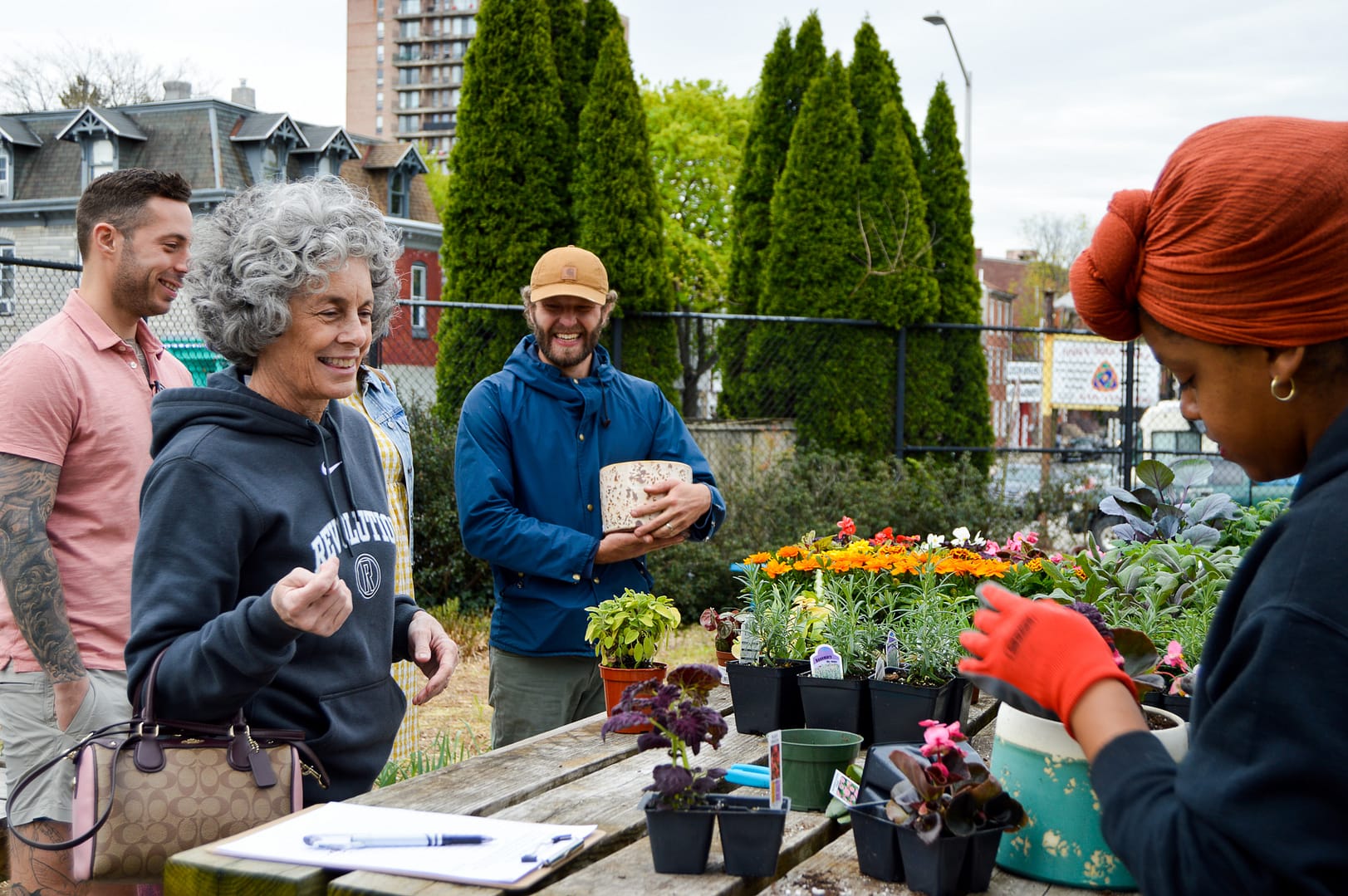 people buying locally grown flowers