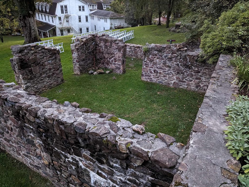 A view of the preserved Lincoln building on the grounds of the historic village from the revolutionary war period herb garden