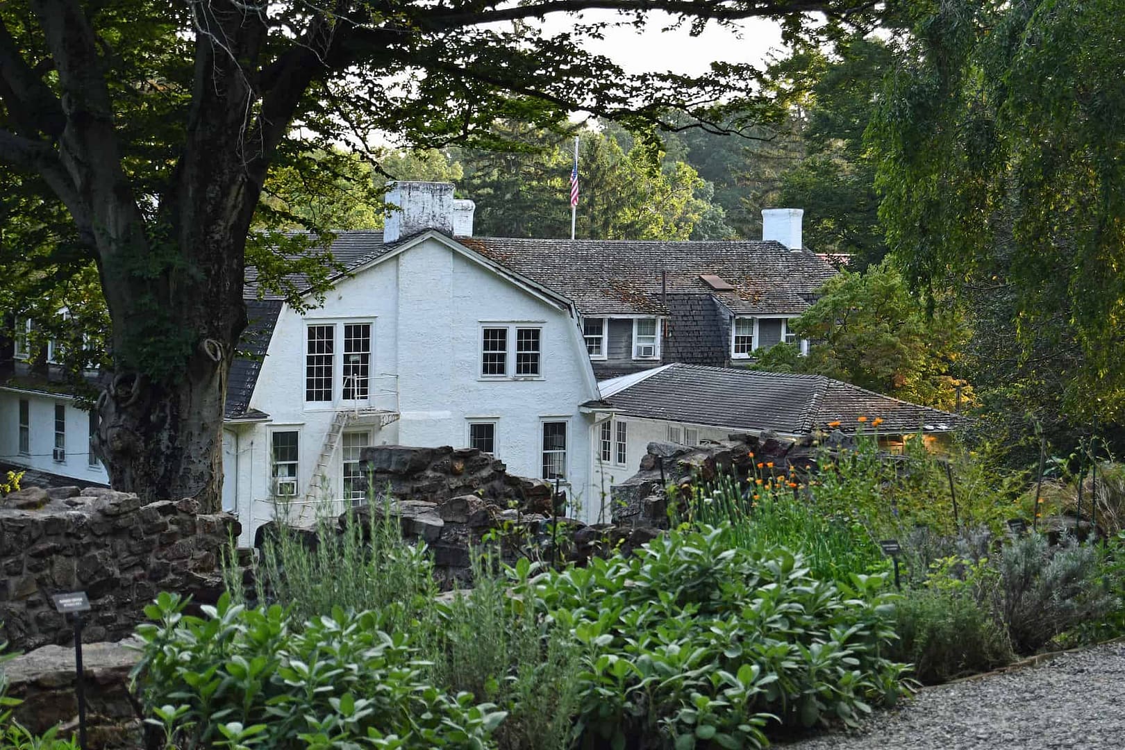 A view of the preserved Lincoln building on the grounds of the historic village from the revolutionary war period herb garden