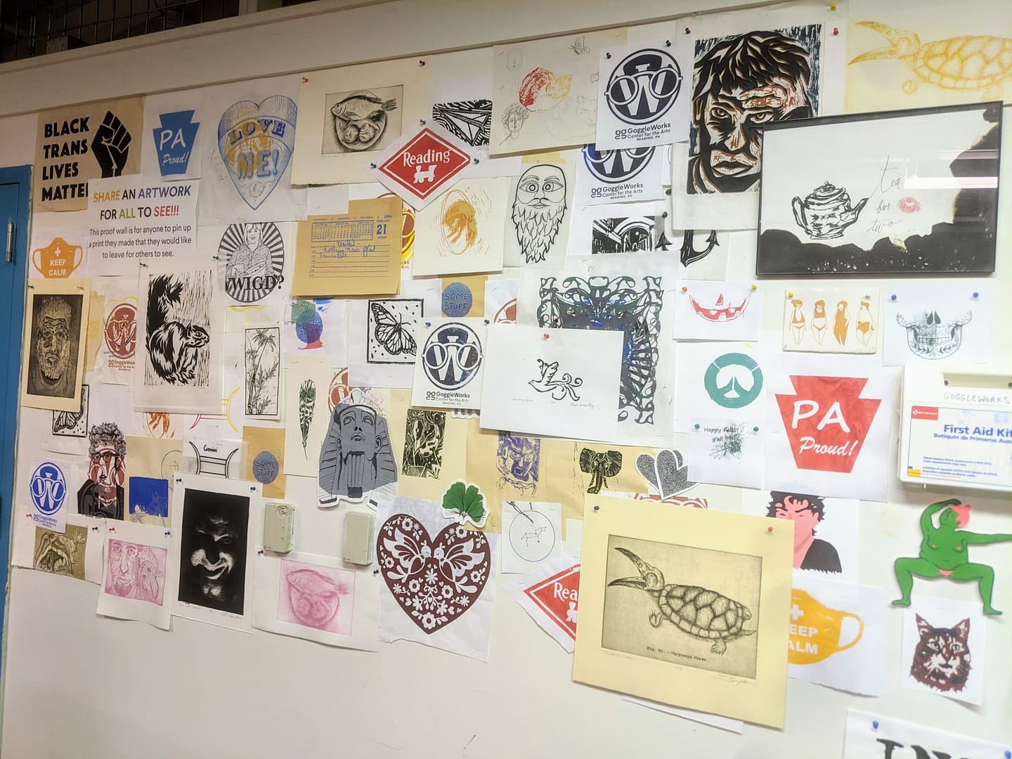 Prints hanging on the wall in the Printmaking studio